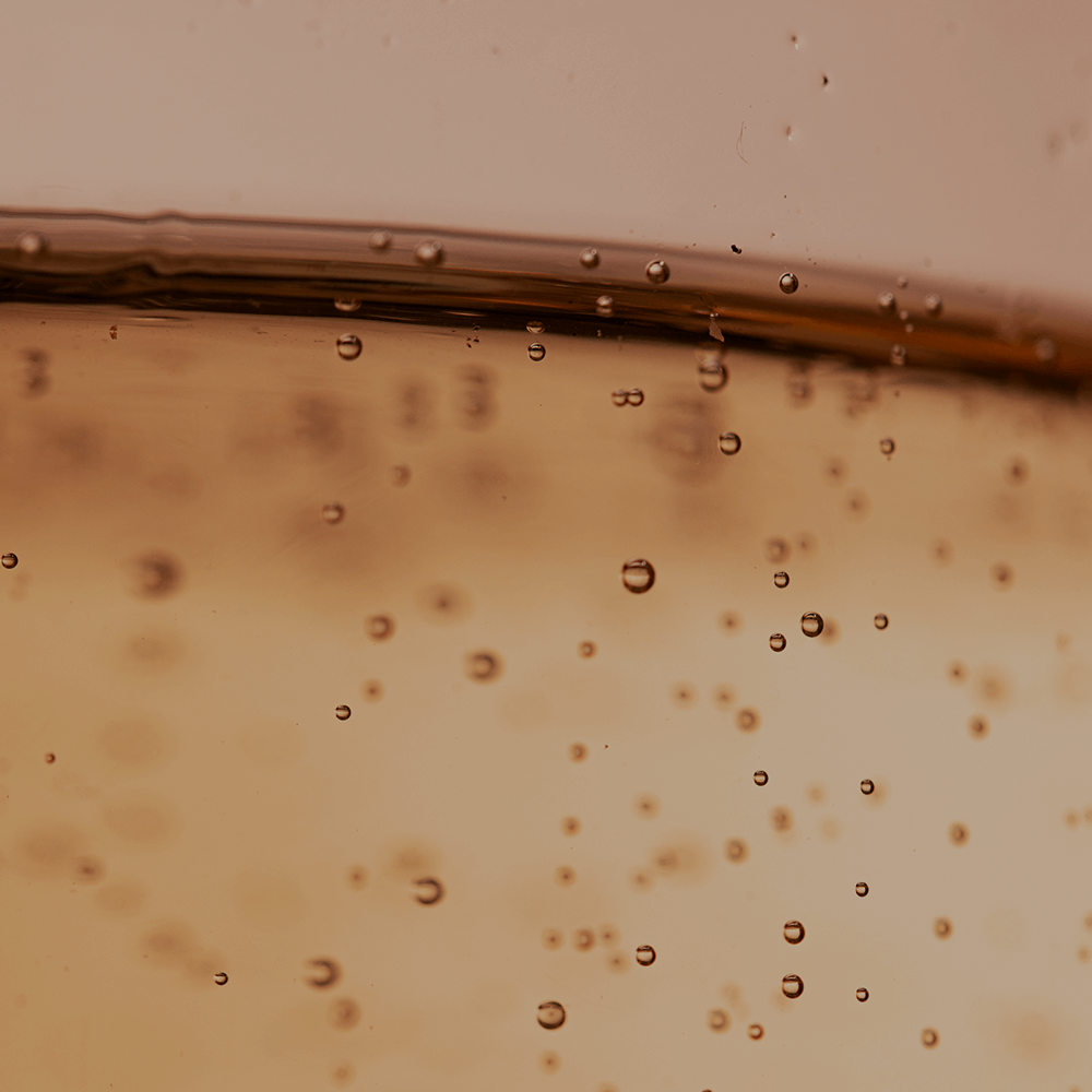 Bubbles in a glass representing skin